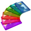 colorful credit cards over white background colorful credit cards over white background