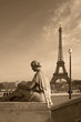 Eiffel tower with a woman's sculpture (Paris, France)