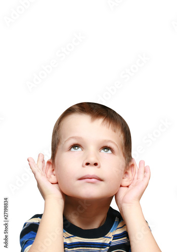 Photo: child looks up and listen child looks up and listen