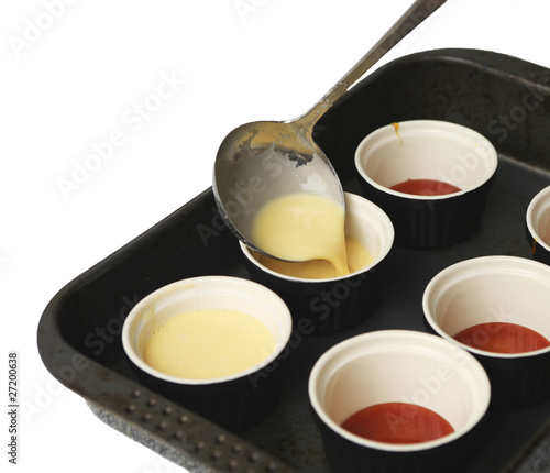 Photo: Making creme caramel. Making creme caramel.
