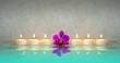 Kerzen mit Orchidee