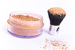 makeup brush and powder
