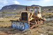 The thrown bulldozer in mountains