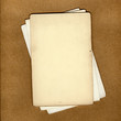 Grunge papers over brown background great for scrapbook