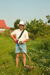 Adult gardener working in the yard