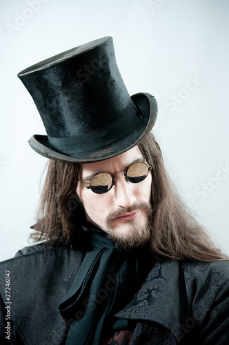 Photo: Retro man with black cylinder Retro man with black cylinder