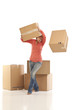 Young woman dropping cardboard boxes Young woman dropping cardboard boxes