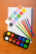 Art concept with painters palette and paint brush