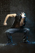 Hip-hop dancer in aqua studio