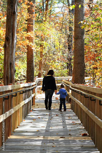 Photo: Young Mother and Child Walking Young Mother and Child Walking