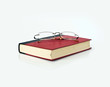 spectacles on book