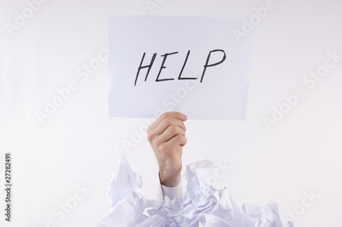 Photo: Businessman overwhelmed by the paper Businessman overwhelmed by the paper
