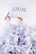 Businessman overwhelmed by the paper