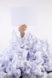 Businessman overwhelmed by the paper