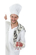 Young attractive caucasian chef male, roast beef Young attractive caucasian chef male, roast beef
