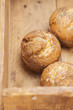 three poppy seeds and lemon muffins in wooden box three poppy seeds and lemon muffins in wooden box