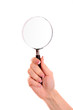 hand holding magnifying glass