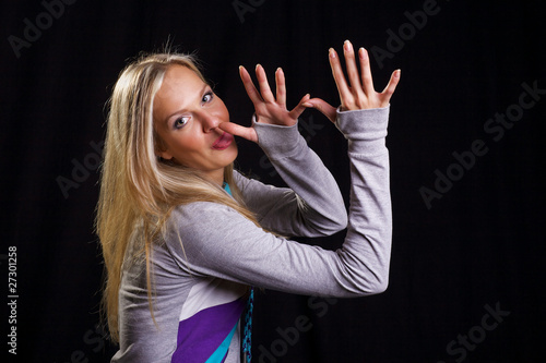 Photo: Informal blonde with casual emotions and gestures Informal blonde with casual emotions and gestures