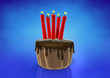 Spark candles on chocolate cake