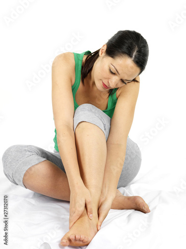 Photo: Young Woman with Ankle Injury. Model Released Young Woman with Ankle Injury. Model Released