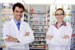 Photo: portrait of pharmacists at pharmacy portrait of pharmacists at pharmacy