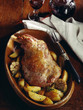 Shoulder of lamb with garlic and patatoes