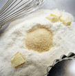 flour, sugar, butter, baking tray and whisk