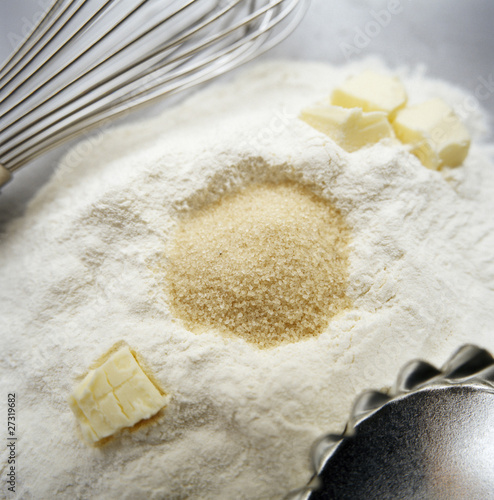 Photo: flour, sugar, butter, baking tray and whisk flour, sugar, butter, baking tray and whisk