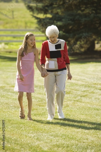 Photo: Grandmother And Granddaughter Holding Hands Grandmother And Granddaughter Holding Hands