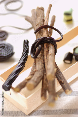Photo: stick of liquorice and liquorice candy stick of liquorice and liquorice candy