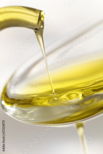 Photo: dash of olive oil filling spoon dash of olive oil filling spoon