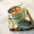 creamed red rice soup with lemon grass and grilled prawns
