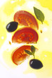 cut tomato and olive in oil