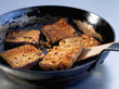 Pan-frying the slices of gingerbread