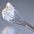 Grilled meringue on a whisk