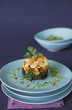 Express shrimps on a bed of spinach,confit tomatoes and lemon with coriander