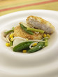 Breaded cod with green vegetables