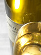 Bottle and glass of white wine