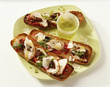 Chicken,dried tomatoes and parmesan open sandwiches