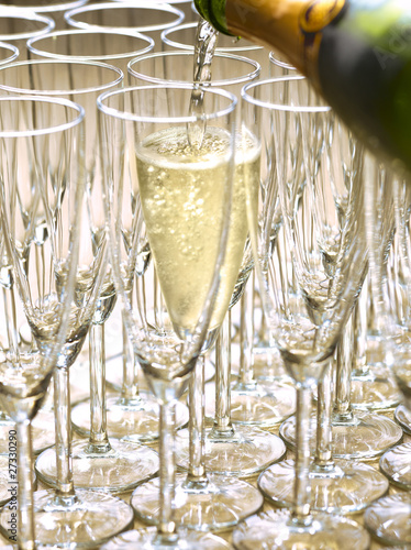Photo: Pouring a glass of champagne Pouring a glass of champagne