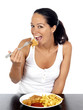 Photo: Young Woman Eating Fish and Chips. Model Released Young Woman Eating Fish and Chips. Model Released