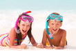 Happy boy and girl on beach