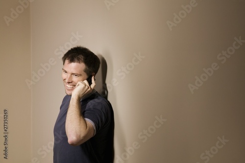 Photo: Man Holding Phone To Ear Man Holding Phone To Ear