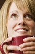 Photo: Woman Holding A Mug Woman Holding A Mug