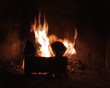 Fireplace with burning fire