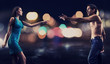 Gorgeous couple over night city street background