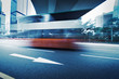 Long exposure photo of bus moving on road. Blurred motion