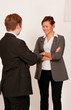 Business people in conversation or small talk