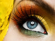 Photo: Yellow eye make-up with flower Yellow eye make-up with flower