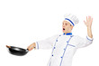 A surprised chef holding a wok A surprised chef holding a wok